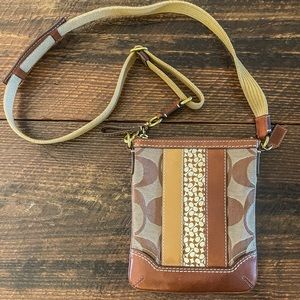 Authentic crossbody Coach bag with adjustable strap. 7x9 inches.